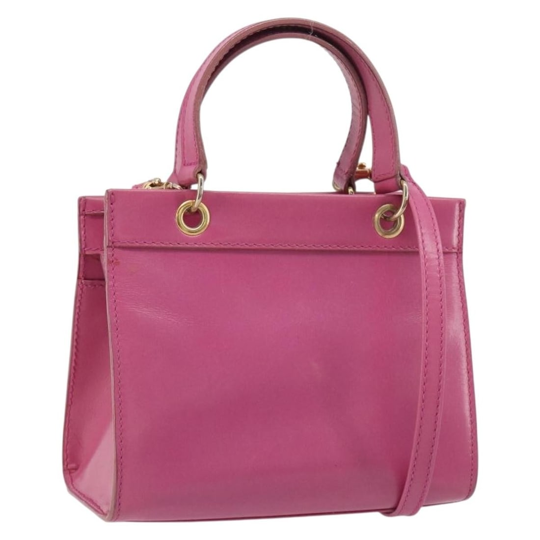 Celine Pink Leather 2way Handbag with Shoulder Strap Gold Tone: Celine Pink Leather 2way Handbag with Shoulder Strap Gold Tone A CELINE leather 2-way handbag in pink with gold-tone accents. It comes with a shoulder strap and can be carried by hand or worn on the s
