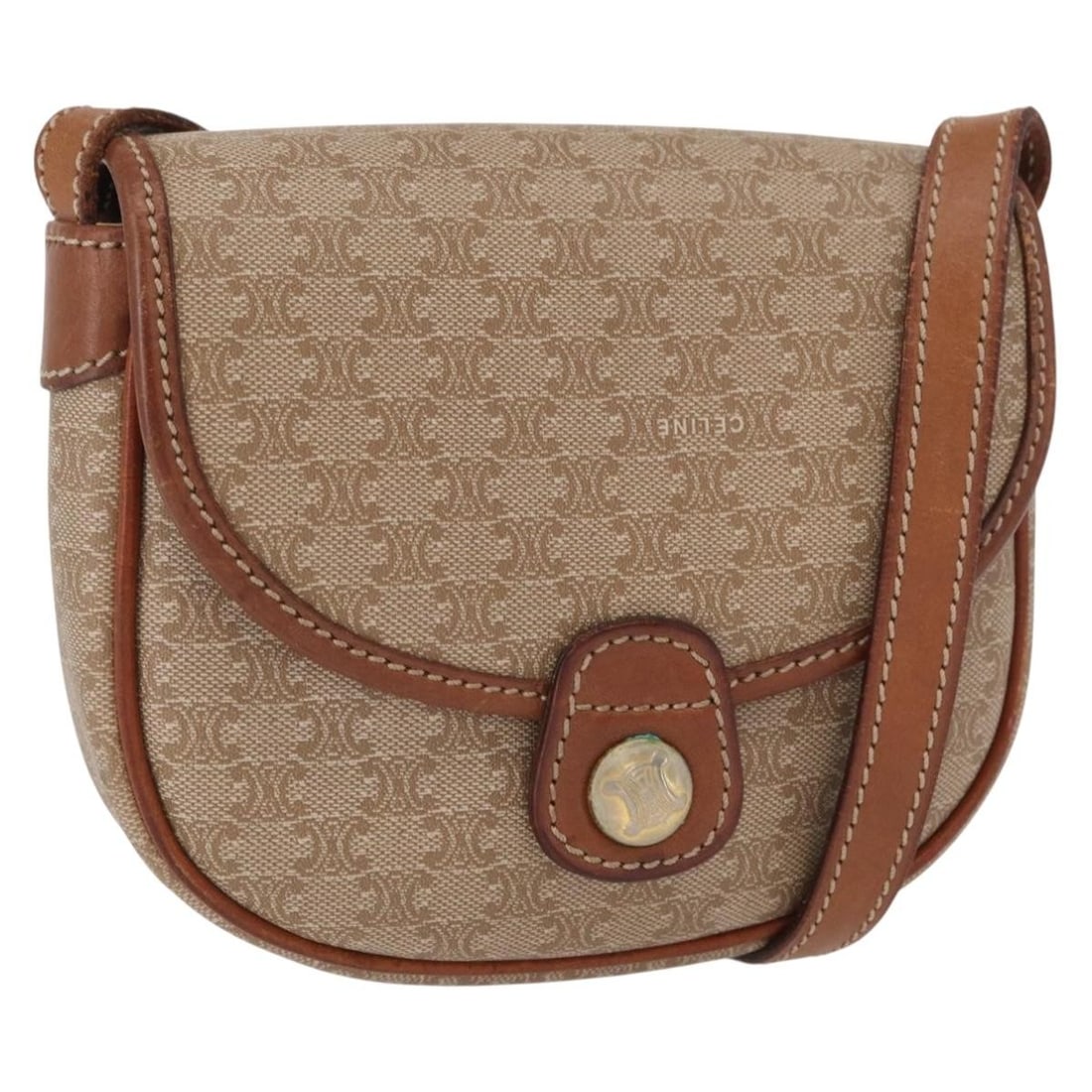 Beige Macadam Canvas Shoulder Bag by CELINE PVC Leather Gold Detail: Beige Macadam Canvas Shoulder Bag by CELINE PVC Leather Gold Detail This CELINE Macadam shoulder bag features beige PVC leather and Macadam canvas with gold-tone accents. The bag includes an adjustabl