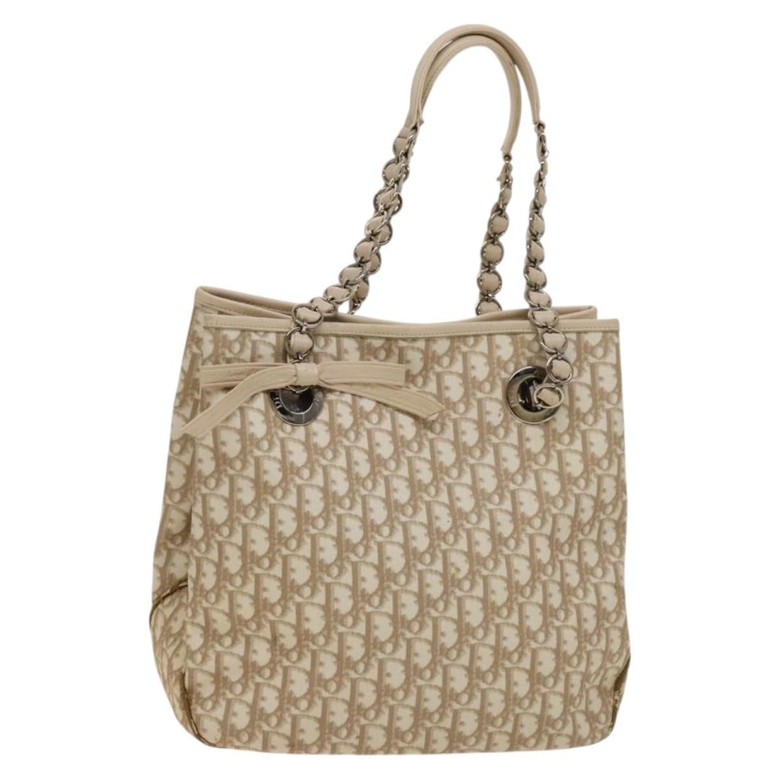 Christian Dior Trotter Canvas Tote in Beige Silver PVC Leather: Christian Dior Trotter Canvas Tote in Beige Silver PVC Leather Christian Dior Trotter canvas tote bag in beige and silver with PVC leather trim. Made in Italy, this women's tote features a roomy every