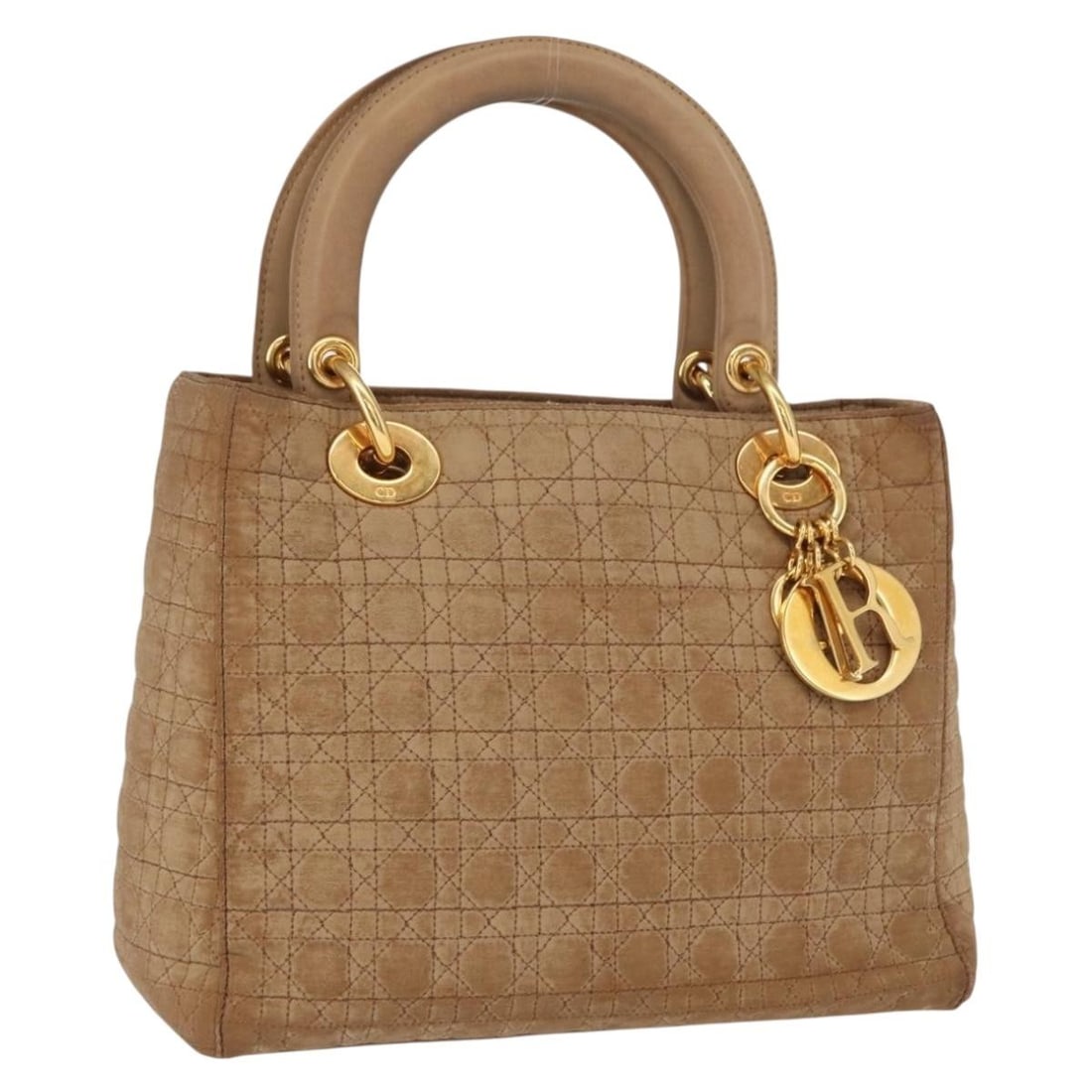 Christian Dior Brown Gold Nylon Handbag Charm Italy: Christian Dior Brown Gold Nylon Handbag Charm Italy This Christian Dior Cannage handbag features a brown and gold nylon exterior with a structured silhouette. Designed for women, it includes a handle 