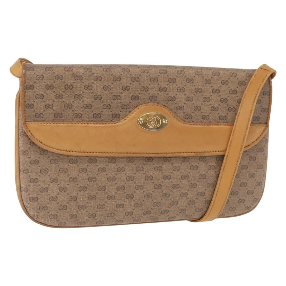 Beige and Gold Gucci Micro GG Supreme PVC Shoulder Bag 104 004 0024: Beige and Gold Gucci Micro GG Supreme PVC Shoulder Bag 104 004 0024 This is a Gucci Micro GG Supreme shoulder bag crafted from beige and gold PVC leather with micro small GG canvas detailing. The bag 