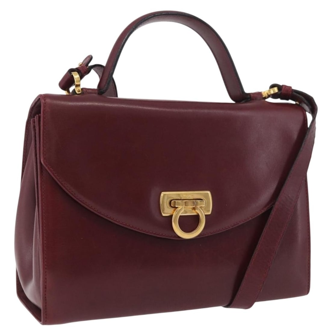 Salvatore Ferragamo Gancini 2way Leather Handbag Bordeaux Gold Tone: Salvatore Ferragamo Gancini 2way Leather Handbag Bordeaux Gold Tone A Salvatore Ferragamo Gancini 2-way handbag in bordeaux leather with gold-tone hardware. It includes a shoulder strap and was made i