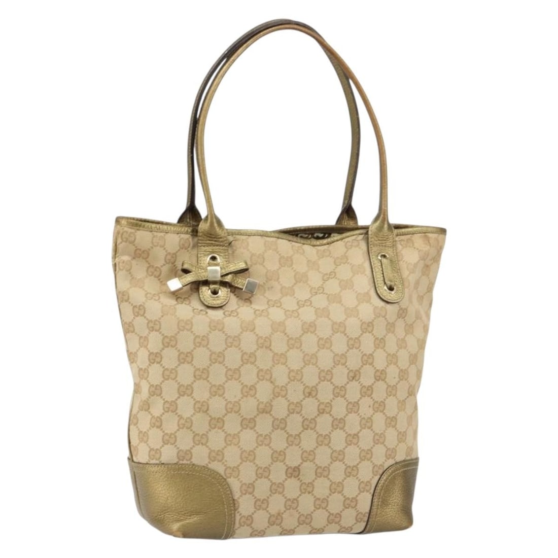Beige GG Canvas Tote Handbag by Gucci Model 181779: Beige GG Canvas Tote Handbag by Gucci Model 181779 This is an authentic Gucci GG Canvas Pretty Tote Bag in beige. Crafted in Italy, the tote features the iconic GG canvas exterior and offers spacious 