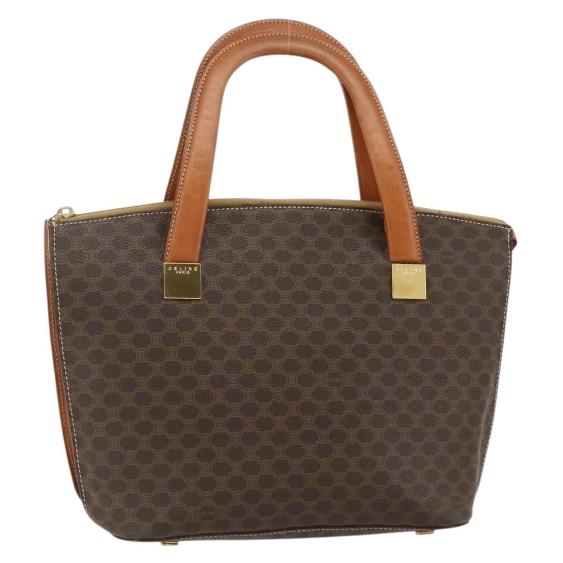 CELINE Macadam Brown PVC Leather Handbag Gold Tone Italy: CELINE Macadam Brown PVC Leather Handbag Gold Tone Italy CELINE Macadam canvas hand bag in brown and gold PVC leather, made in Italy. This women's handbag features Macadam canvas and PVC leather const