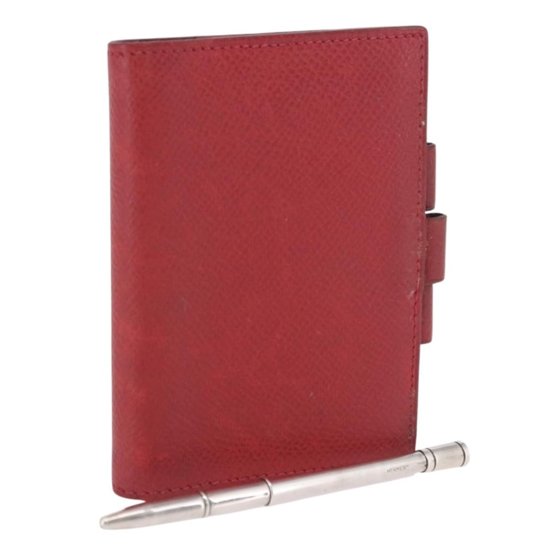 Hermes red leather day planner cover with ballpoint pen: Hermes red leather day planner cover with ballpoint pen Authentic Hermes Agenda Vision day planner cover and ballpoint pen set in red leather. Made in France, this compact planner cover shows heavy us