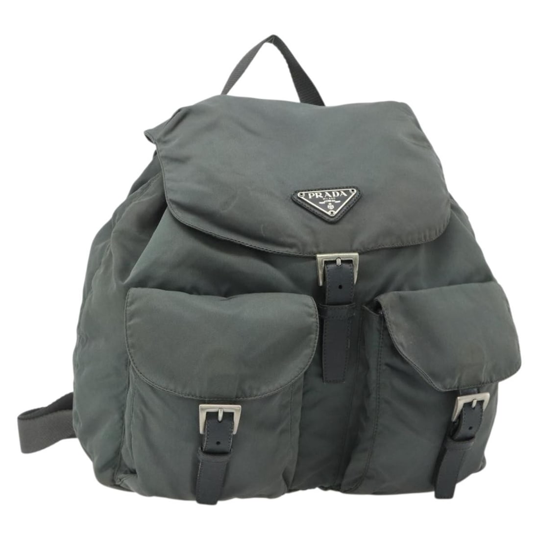 Prada Gray Silver Nylon Backpack Italy: Prada Gray Silver Nylon Backpack Italy This PRADA backpack is crafted from durable nylon in a gray and silver color scheme. Designed for women, it features a spacious interior and practical compartmen