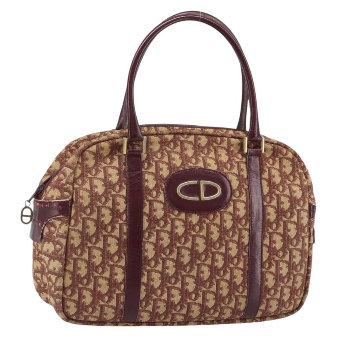 Christian Dior Red Trotter Canvas Handbag Gold Accents France: Christian Dior Red Trotter Canvas Handbag Gold Accents France This Christian Dior Trotter Canvas handbag features a red and gold exterior and is crafted from Trotter canvas. Designed for women, it has