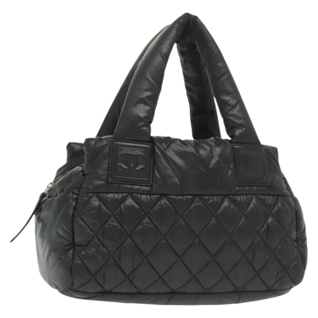 CHANEL Cococoon Black Nylon Hand Bag Silver Tone CC: CHANEL Cococoon Black Nylon Hand Bag Silver Tone CC A CHANEL Cococoon hand bag in black and silver, made from nylon and crafted in Italy. The bag measures approximately 30 cm W x 20 cm H x 12 cm D, wi