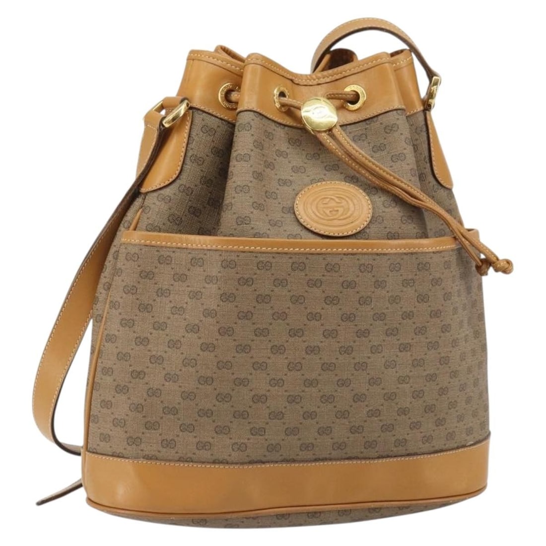 Beige PVC Micro GG Supreme Shoulder Bag by Gucci Italy: Beige PVC Micro GG Supreme Shoulder Bag by Gucci Italy This GUCCI Micro GG Supreme shoulder bag is crafted from beige and gold PVC leather with micro GG canvas detailing. Designed with a classic shoul