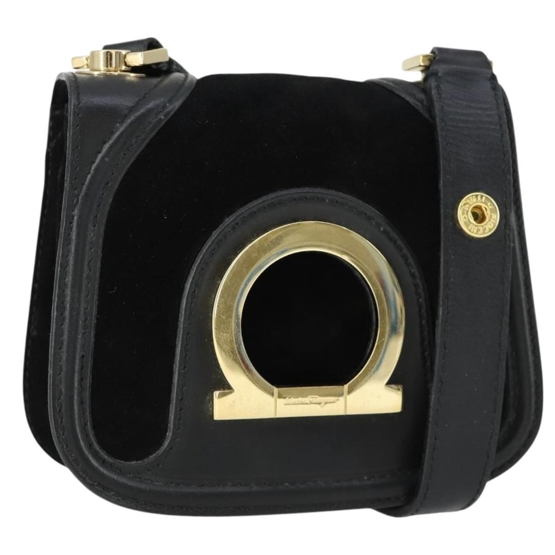Black Suede Gancini Shoulder Bag by Salvatore Ferragamo Gold Accents: Black Suede Gancini Shoulder Bag by Salvatore Ferragamo Gold Accents This Salvatore Ferragamo Gancini shoulder bag features a black suede exterior with gold-tone detailing. The compact design includes