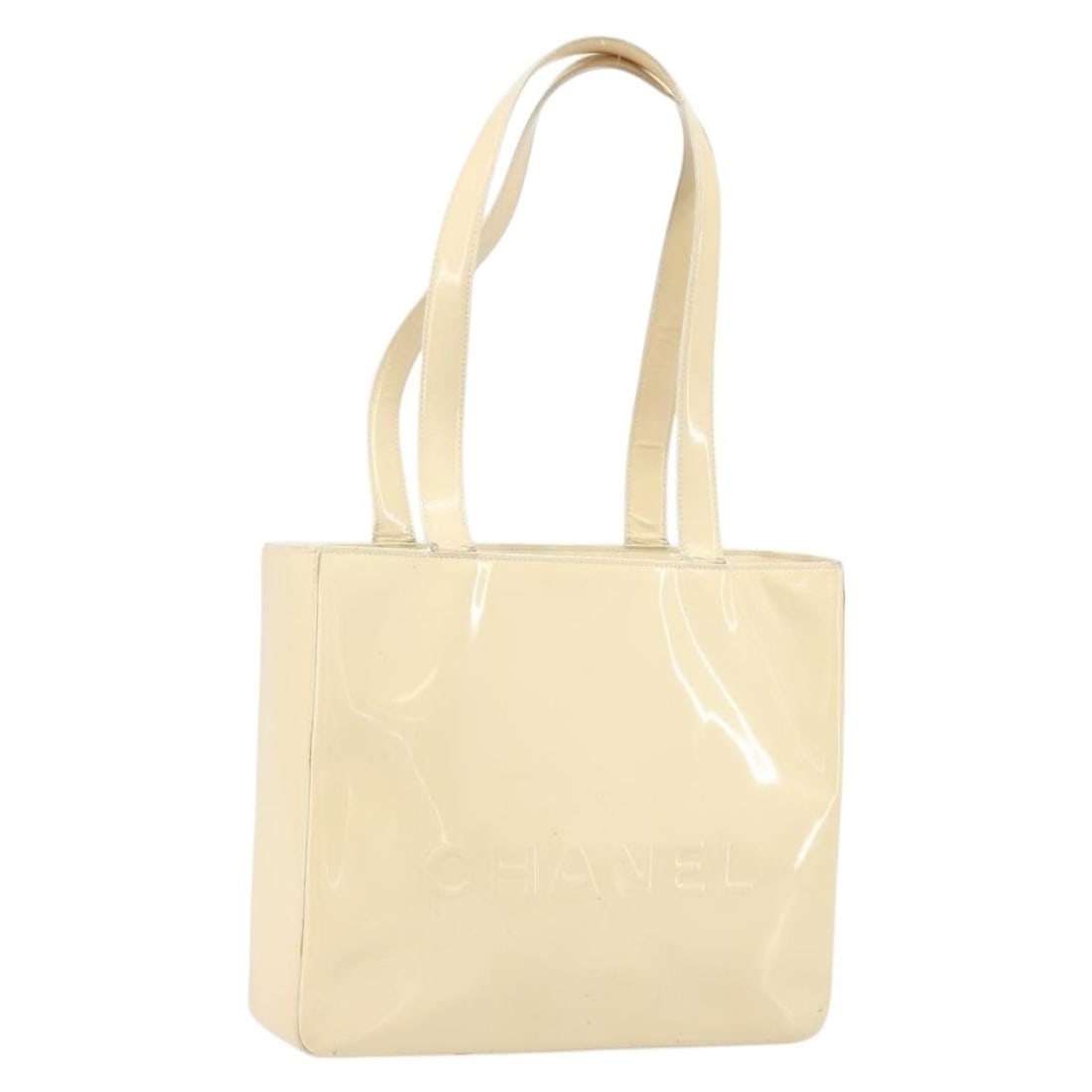 Chanel Beige Patent Leather Tote with Gold CC and Guarantee Card: Chanel Beige Patent Leather Tote with Gold CC and Guarantee Card This CHANEL tote bag is crafted from beige and gold patent leather and features the iconic CC logo. The bag is made in Italy and includ