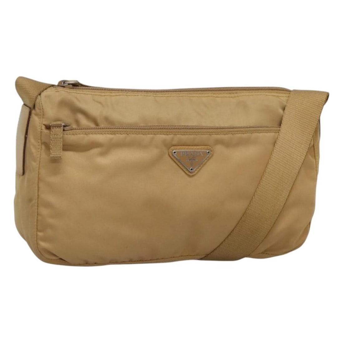 Prada Beige Nylon Shoulder Bag Silver Trim Italy: Prada Beige Nylon Shoulder Bag Silver Trim Italy This PRADA shoulder bag is crafted from beige nylon with silver-tone accents and features a practical, adjustable strap. Made in Italy, it offers a spa