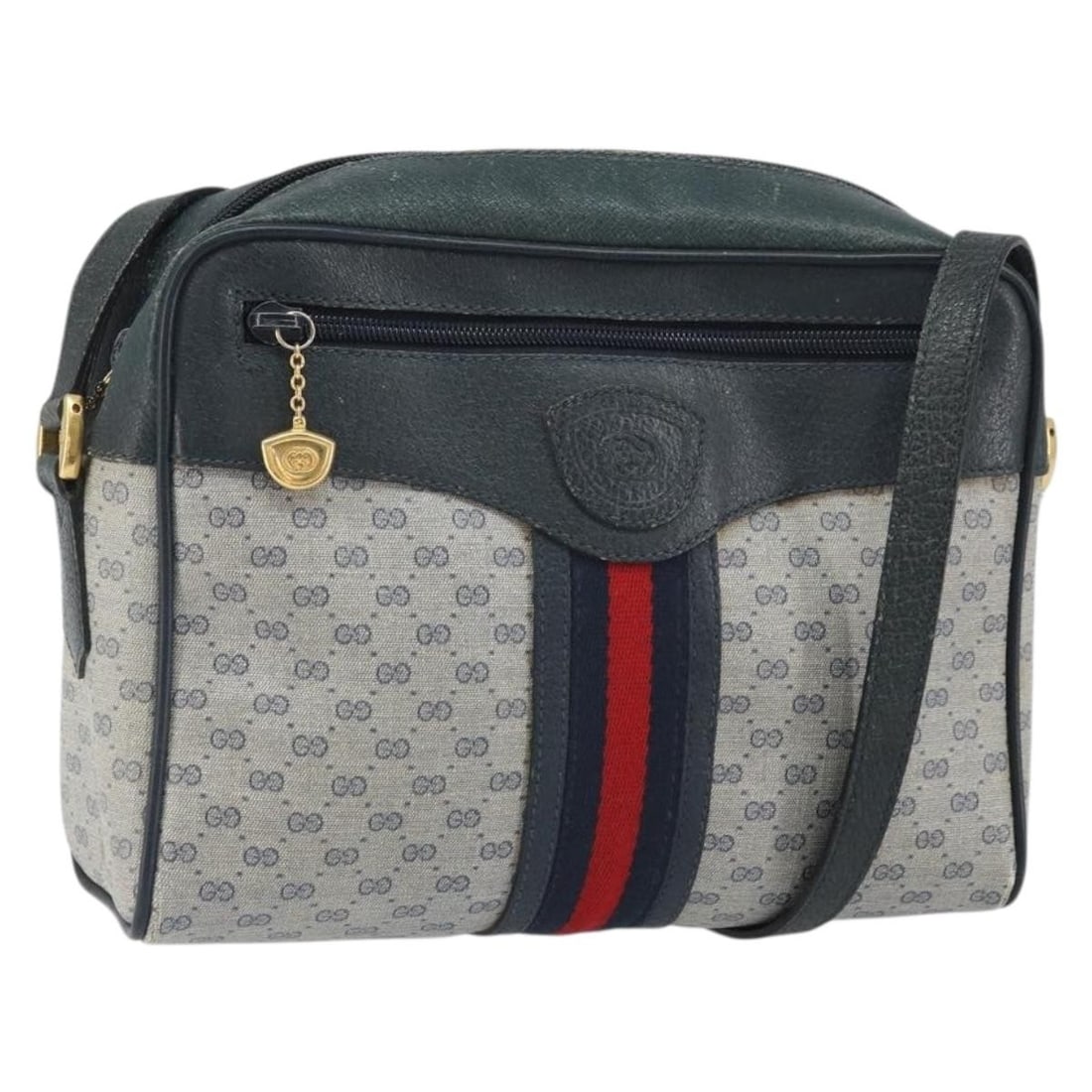 Navy Gold Micro GG Supreme PVC Shoulder Bag Gucci 001 56 0852: Navy Gold Micro GG Supreme PVC Shoulder Bag Gucci 001 56 0852 This Gucci Micro GG Supreme Sherry Line shoulder bag features navy PVC leather with micro small GG canvas and gold-tone hardware. It has a