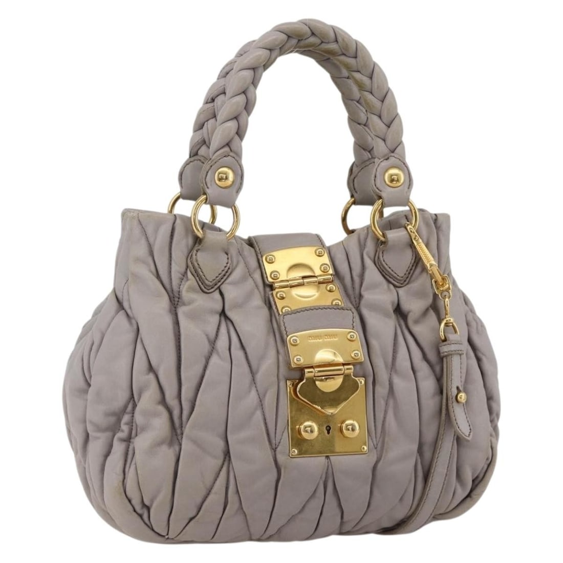 Miu Miu Matelasse Purple Gold Leather 2way Shoulder Bag Auth YKZ1155: Miu Miu Matelasse Purple Gold Leather 2way Shoulder Bag Auth YKZ1155 This Miu Miu Matelasse handbag is crafted from leather in a striking purple and gold color combination. Designed for versatility, i