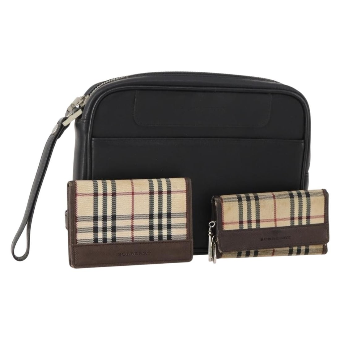 Burberry Nova Check Canvas Leather Pouch 3 Piece Set: Burberry Nova Check Canvas Leather Pouch 3 Piece Set This is a set of three Burberry Nova Check pouches crafted from beige and black canvas with leather accents. Designed for women, these pouches are 