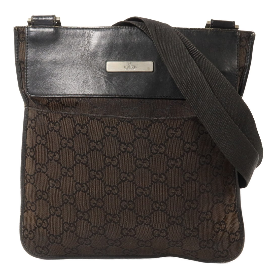 Gucci 019.0348 Black GG Canvas Shoulder Bag SHW: Gucci 019.0348 Black GG Canvas Shoulder Bag SHW GUCCI GG SHW shoulder bag in black GG canvas, model no. 019.0348. It features a compact flat profile with an adjustable shoulder strap and multiple pock