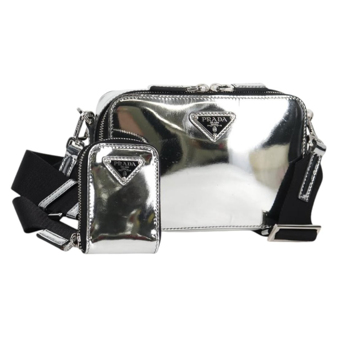 PRADA 2VH070 Leather Shoulder Bag in Silver with Dust Bag: PRADA 2VH070 Leather Shoulder Bag in Silver with Dust Bag A Prada shoulder bag in silver leather, made in Italy. It comes with a dust bag, guarantee card, and pouch. The bag shows heavy use with visib