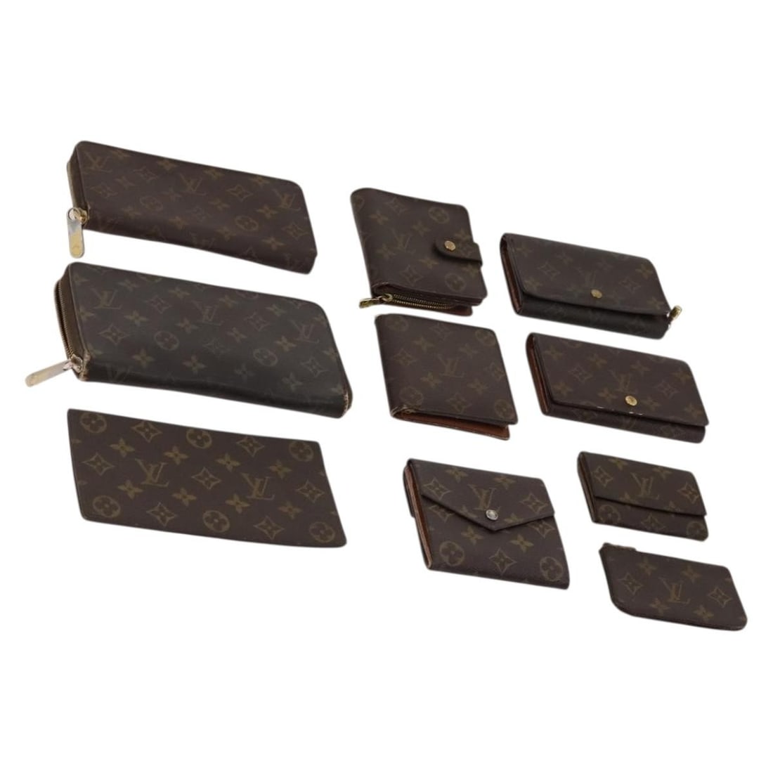 10 Louis Vuitton Monogram Canvas Wallets Bundle Auth CB204: 10 Louis Vuitton Monogram Canvas Wallets Bundle Auth CB204 Louis Vuitton Monogram wallet in Monogram Canvas, offered in heavily used condition. The item is a wallet style piece and is being sold as th