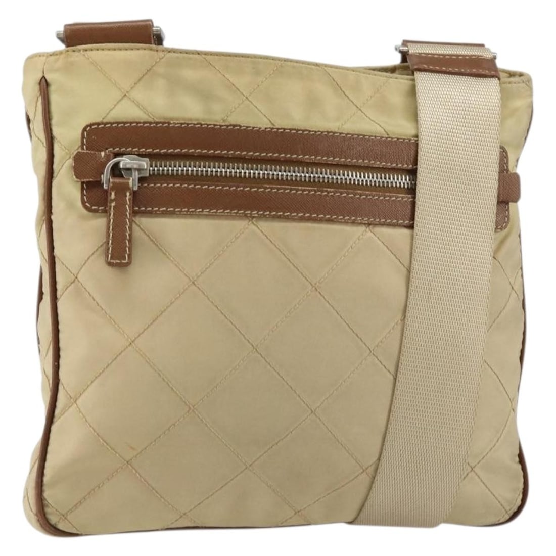 Prada beige silver nylon quilted shoulder bag Italy: Prada beige silver nylon quilted shoulder bag Italy This PRADA shoulder bag features a quilted design crafted from beige nylon with silver accents. Designed for women, it offers a practical size with 