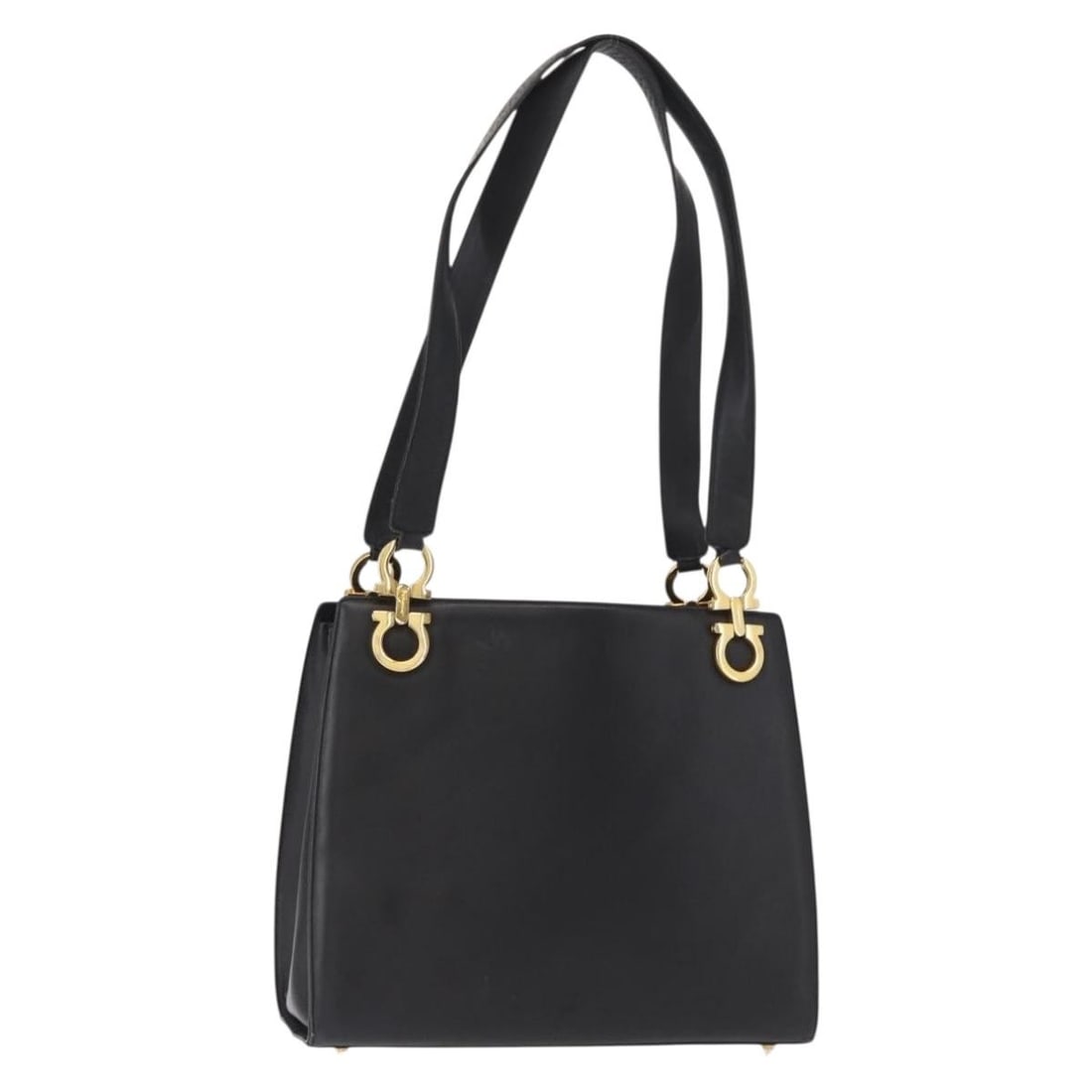 Ferragamo Gancini black gold leather tote bag Italy: Ferragamo Gancini black gold leather tote bag Italy This Salvatore Ferragamo Gancini tote bag is crafted from black leather with gold-tone accents. Made in Italy, the bag features a spacious design wi