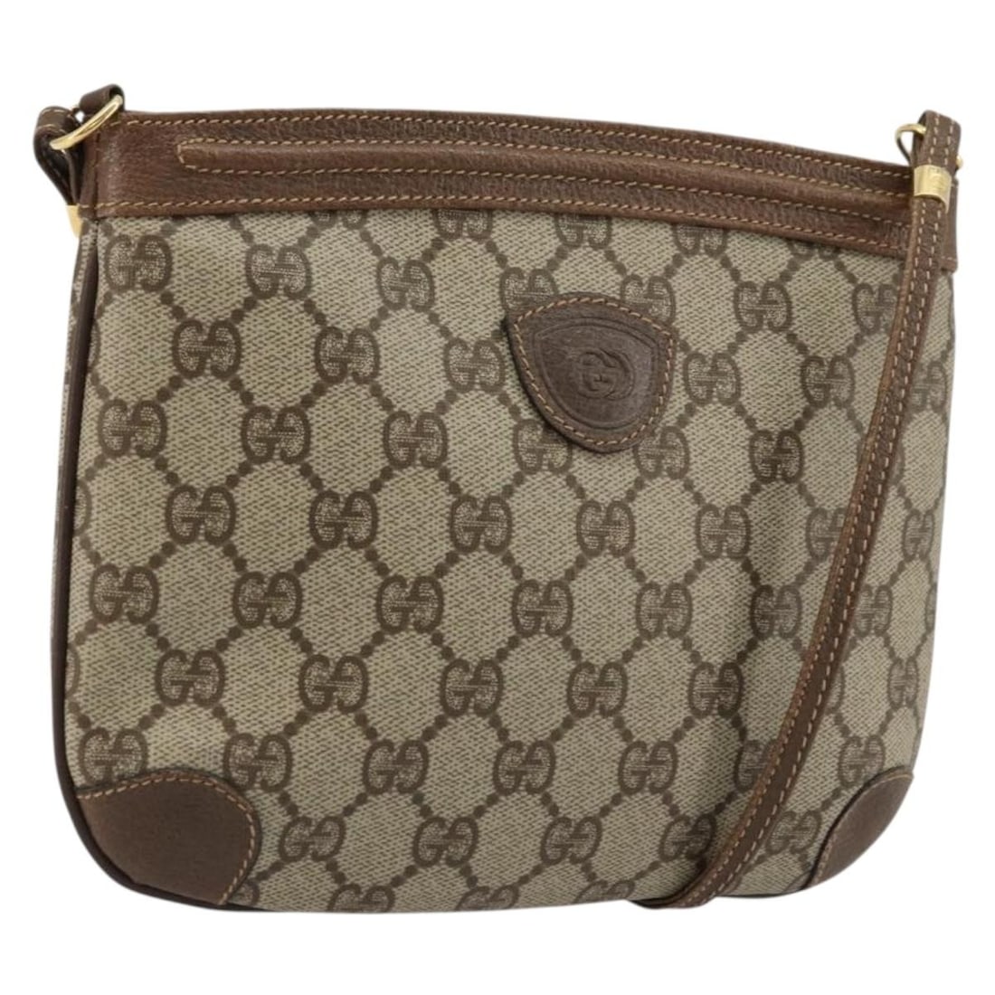 Gucci GG Supreme Beige Gold PVC Shoulder Bag Italy: Gucci GG Supreme Beige Gold PVC Shoulder Bag Italy This GUCCI GG Supreme shoulder bag features a beige and gold design crafted from PVC leather and GG canvas. Made in Italy, the bag has a compact silh