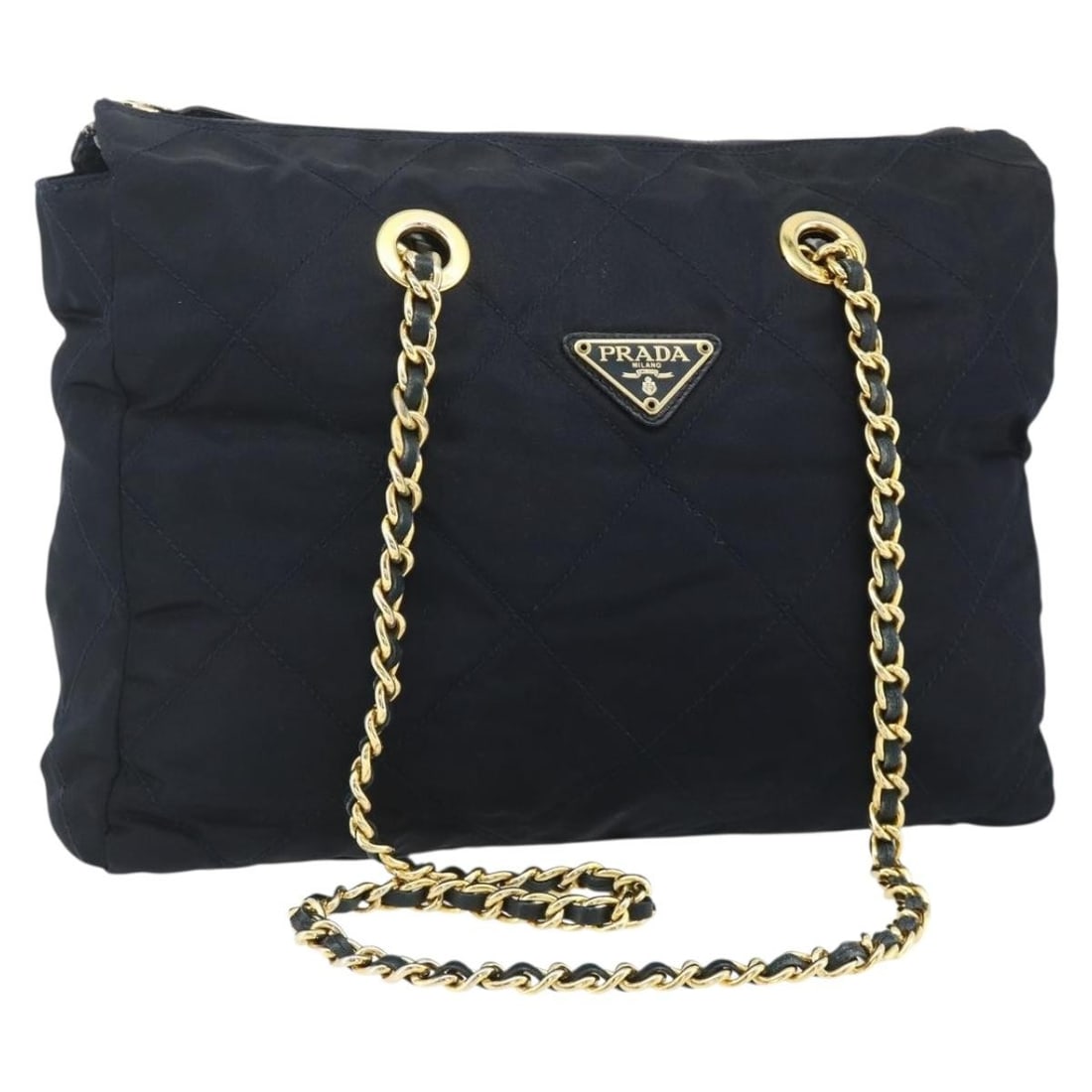 Prada navy nylon tote with gold chain Italy: Prada navy nylon tote with gold chain Italy This PRADA chain tote bag is crafted from navy nylon with gold-tone accents. Designed for women, it features a spacious interior and a practical handle drop