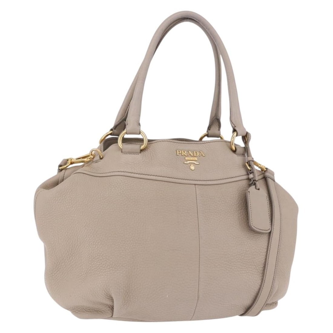 Prada 2way Leather Tote Bag Beige Gold with Strap and Name Tag: Prada 2way Leather Tote Bag Beige Gold with Strap and Name Tag A beige and gold Prada leather tote bag in a 2-way style, made in Italy. It comes with a name tag and shoulder strap. The bag shows heavy