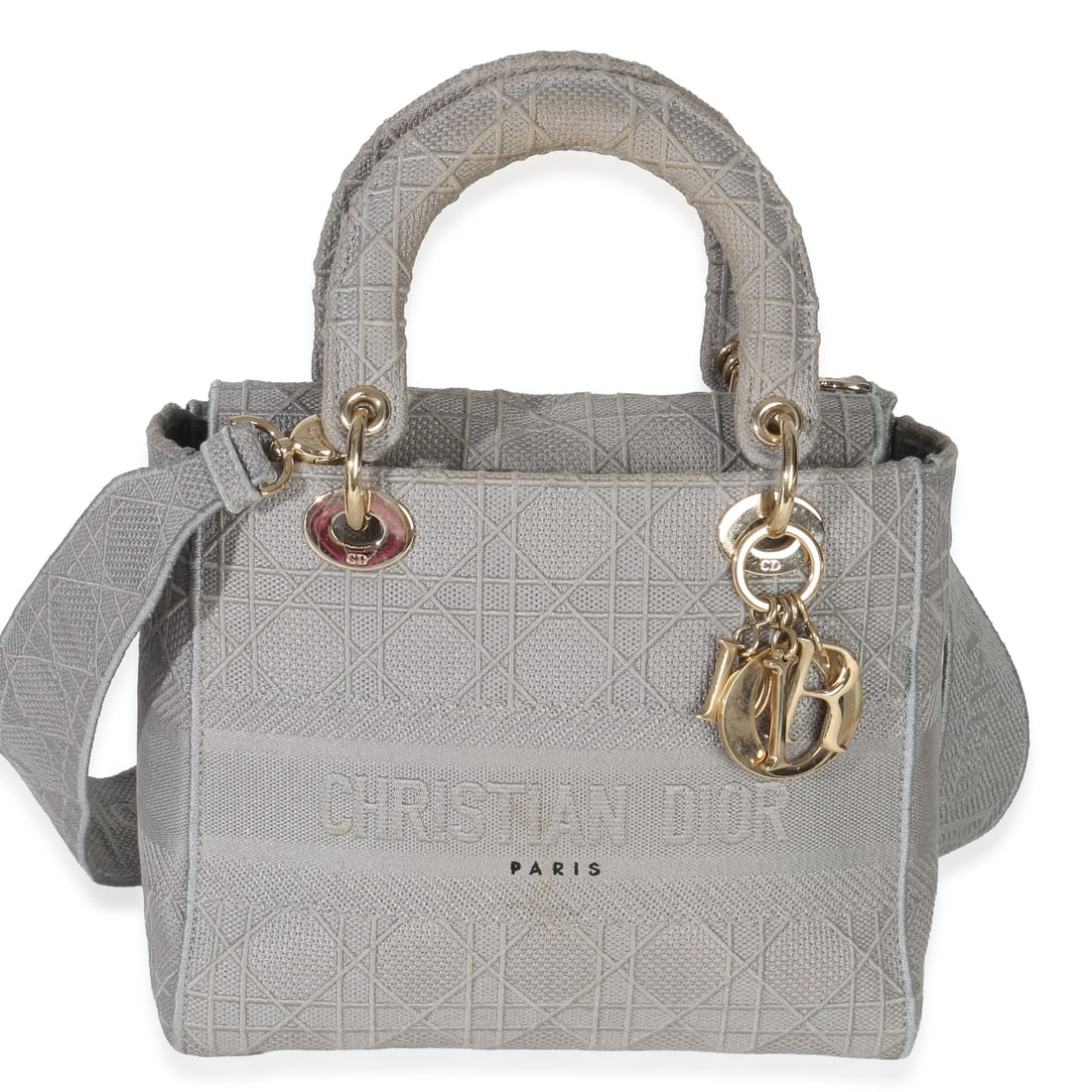 Christian Dior Lady Dior Gray Cannage Embroidered Canvas Bag: Christian Dior Lady Dior Gray Cannage Embroidered Canvas Bag This Christian Dior Lady D-Lite Bag features gray canvas with signature Cannage embroidery, offering a sophisticated and versatile design. 