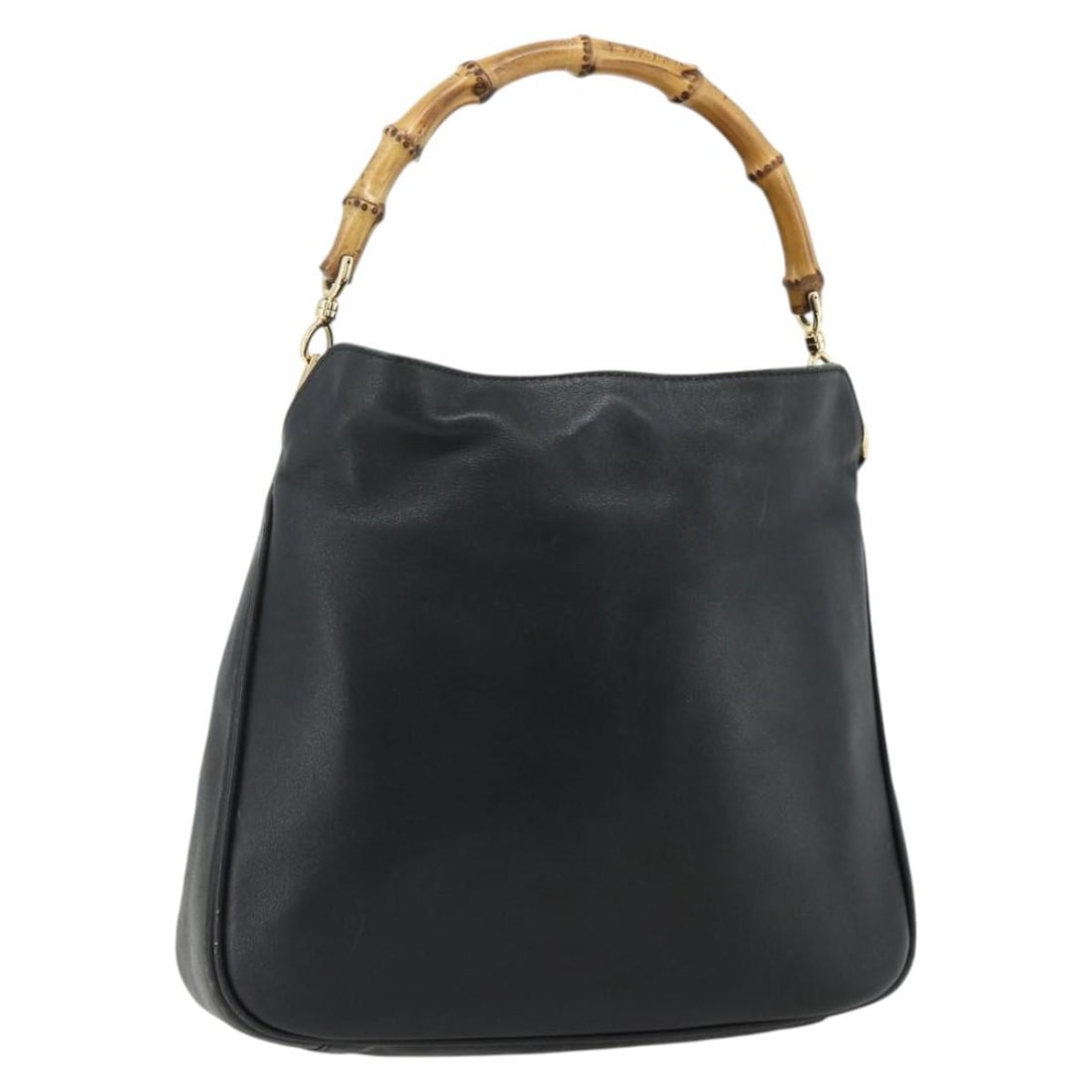 Gucci Bamboo leather black gold handbag 001 2404 Italy: Gucci Bamboo leather black gold handbag 001 2404 Italy This GUCCI Bamboo handbag features black leather with gold accents, showcasing the iconic bamboo handle design. Made in Italy, the bag measures a