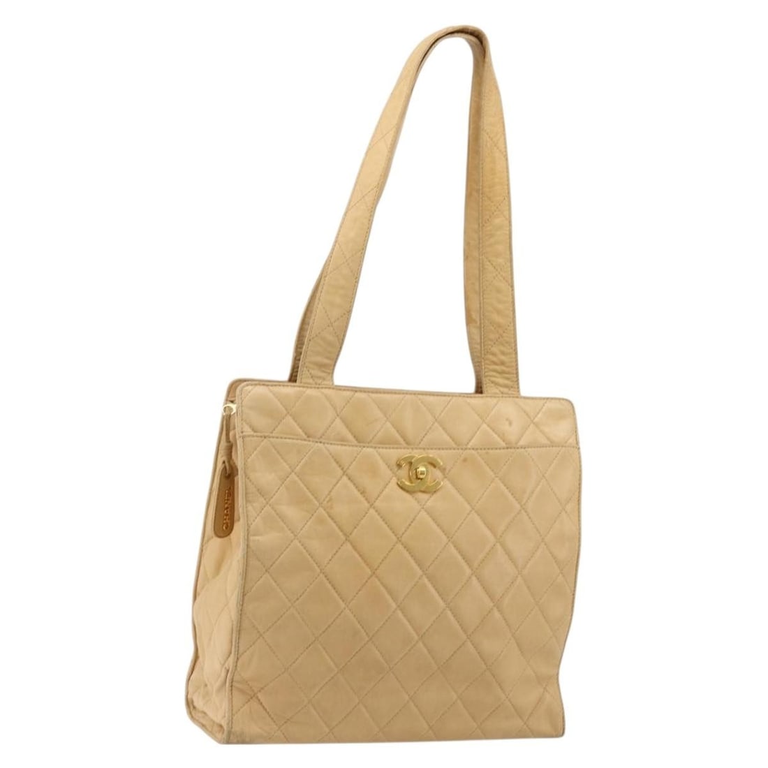 CHANEL Matelasse Lamb Skin Shoulder Bag Beige Gold CC: CHANEL Matelasse Lamb Skin Shoulder Bag Beige Gold CC This CHANEL Matelasse shoulder bag is crafted in beige lamb skin with gold-tone exterior accents. It features a shoulder strap with an approximate