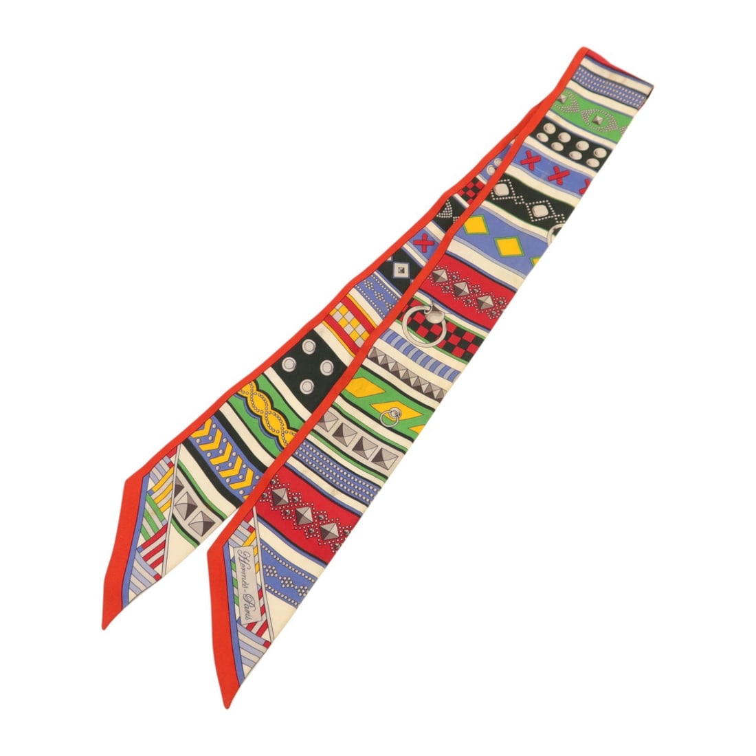 Hermes Twilly Silk Scarf Red Blue Multicolor: Hermes Twilly Silk Scarf Red Blue Multicolor Hermes Twilly scarf in silk with a red, blue, and multicolor design. It is a women's regular-size scarf made in France and offered in heavily used conditio