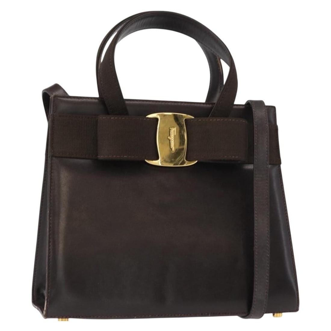 Salvatore Ferragamo Brown Leather Hand Bag with Gold Accents: Salvatore Ferragamo Brown Leather Hand Bag with Gold Accents This Salvatore Ferragamo hand bag combines elegance and functionality, crafted from high-quality leather in a sophisticated brown and gold 
