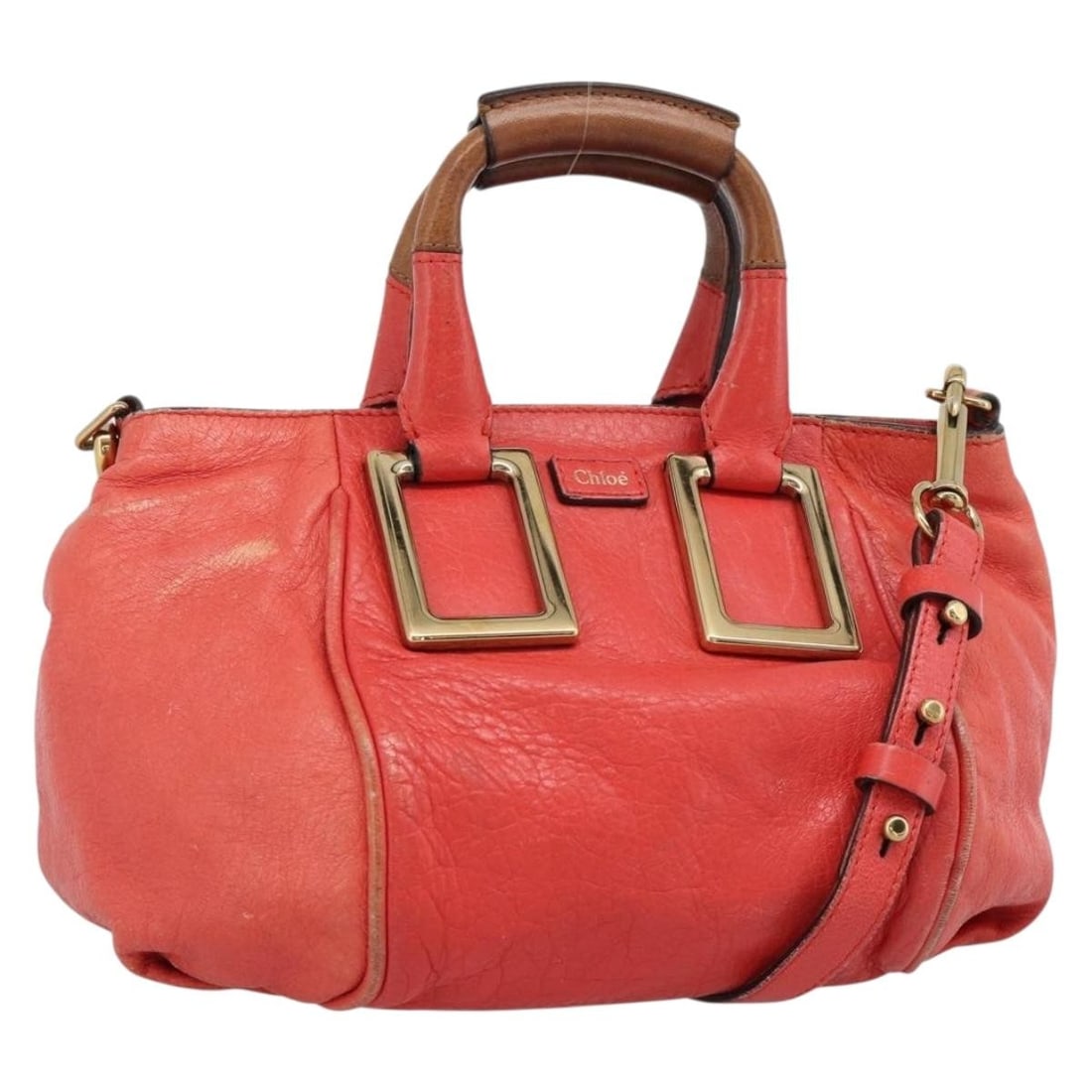 Chloe Etel Red Leather 2way Handbag Gold Tone Italy: Chloe Etel Red Leather 2way Handbag Gold Tone Italy A Chloe Etel 2-way handbag in red with gold-tone details, crafted from leather. Made in Italy, it features a shoulder strap and handle for versatile