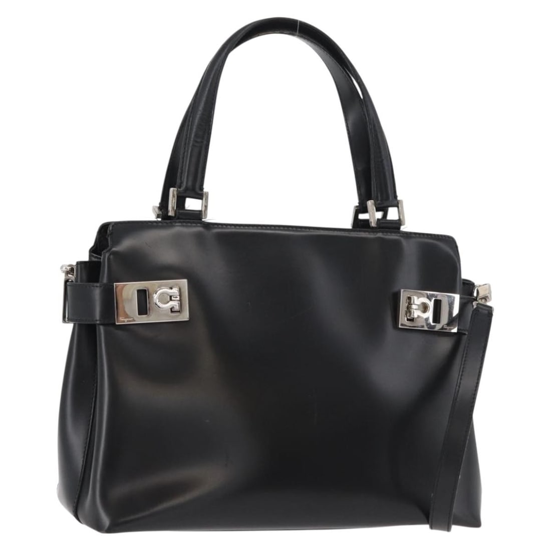 Salvatore Ferragamo Gancini leather 2way handbag black silver strap: Salvatore Ferragamo Gancini leather 2way handbag black silver strap Salvatore Ferragamo Gancini 2-way handbag in black leather with silver-tone accents. Designed for women, this Italian-made bag inclu