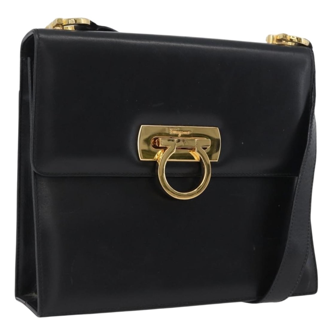 Gancini Black Leather Shoulder Bag by Salvatore Ferragamo Gold Tone Hardware: Gancini Black Leather Shoulder Bag by Salvatore Ferragamo Gold Tone Hardware This Salvatore Ferragamo Gancini shoulder bag is crafted from black leather with gold-tone accents. Designed for women, it 
