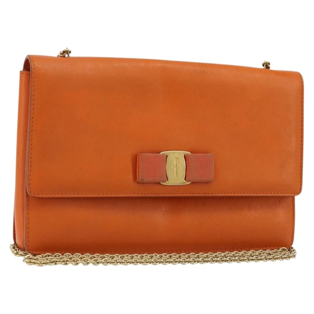 Ferragamo Vala orange gold leather shoulder bag: Ferragamo Vala orange gold leather shoulder bag This Salvatore Ferragamo Vala chain shoulder bag is crafted from orange leather with gold-tone accents. Designed for women, it features a compact silhou
