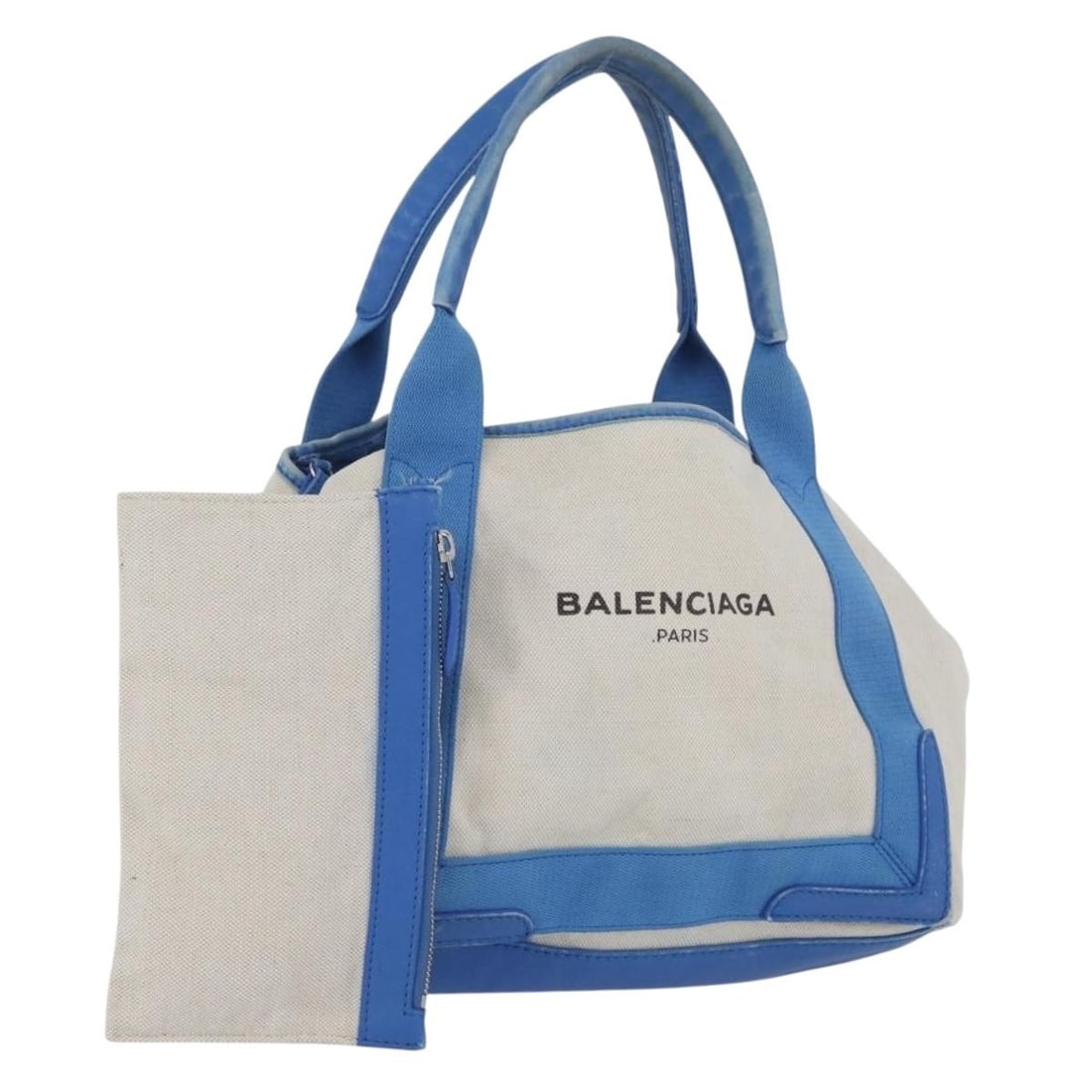 Balenciaga Light Beige and Blue Canvas Cabas Handbag with Pouch: Balenciaga Light Beige and Blue Canvas Cabas Handbag with Pouch This Balenciaga Cabas handbag features a light beige and light blue canvas exterior with leather accents. Designed for women, the bag in