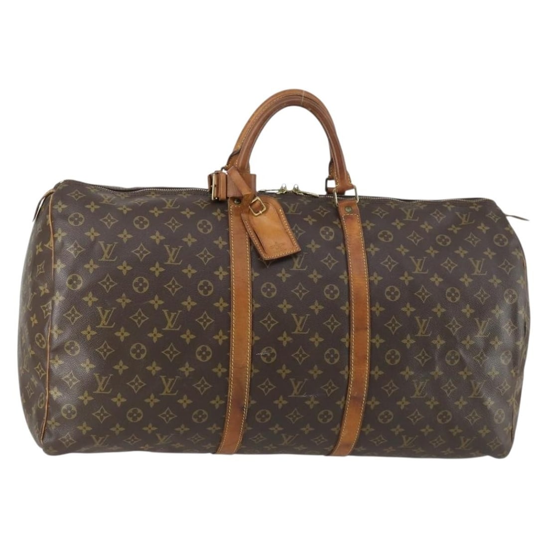 Louis Vuitton M41422 Keepall 60 Monogram Canvas Boston Bag: Louis Vuitton M41422 Keepall 60 Monogram Canvas Boston Bag Louis Vuitton Keepall 60 Boston bag in Monogram canvas, model M41422, made in France. This heavily used bag includes a name tag and Powanie. 