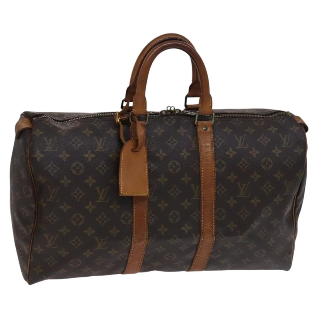 Louis Vuitton M41428 Keepall 45 Monogram Canvas Boston Bag: Louis Vuitton M41428 Keepall 45 Monogram Canvas Boston Bag Louis Vuitton Keepall 45 Boston Bag in Monogram Canvas, made in France. This women's bag comes with a name tag accessory and measures approxi