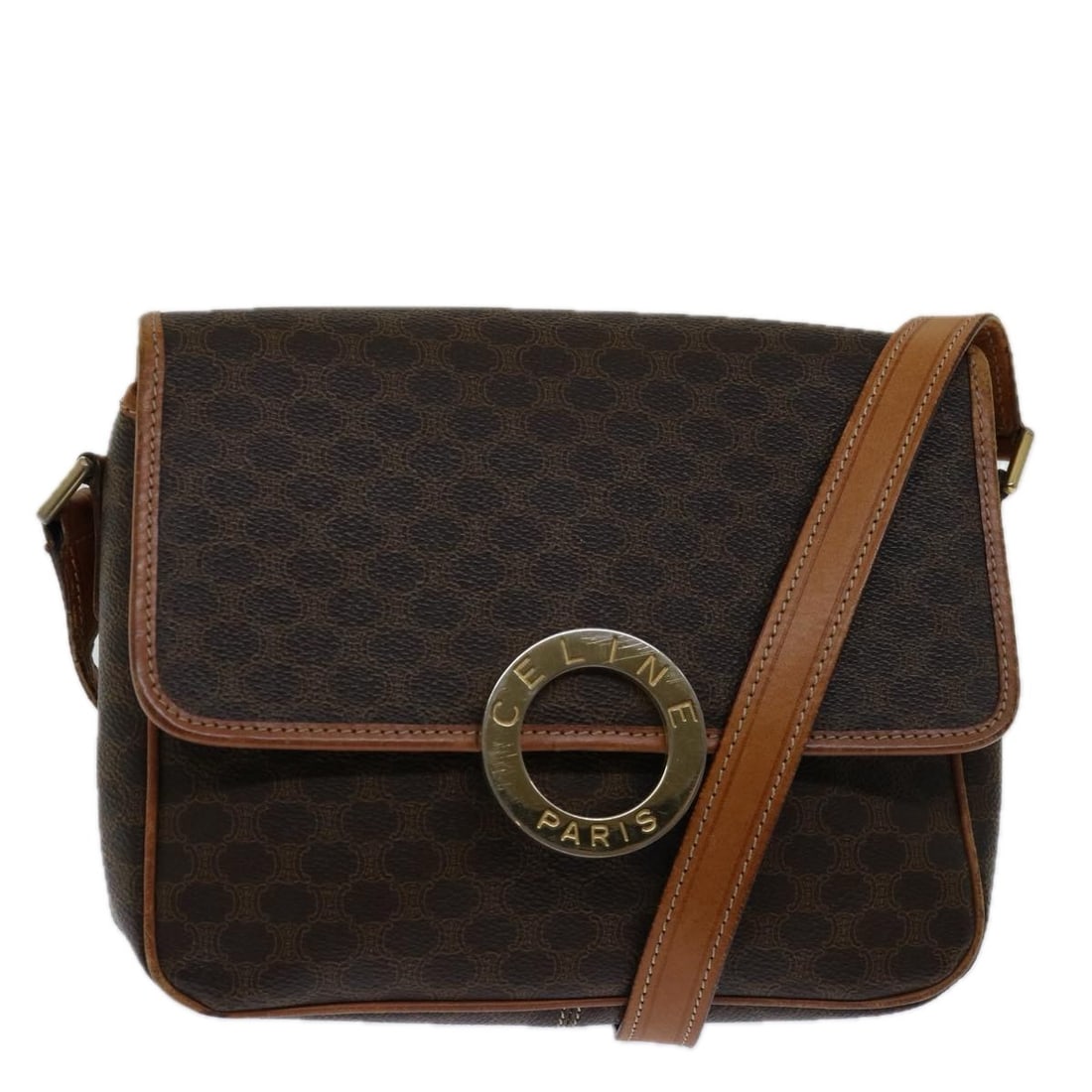 Celine Macadam Canvas Brown PVC Shoulder Bag: Celine Macadam Canvas Brown PVC Shoulder Bag This CELINE Macadam Canvas shoulder bag is crafted from brown PVC leather and features the brand's signature Macadam pattern. Designed for women, it offers