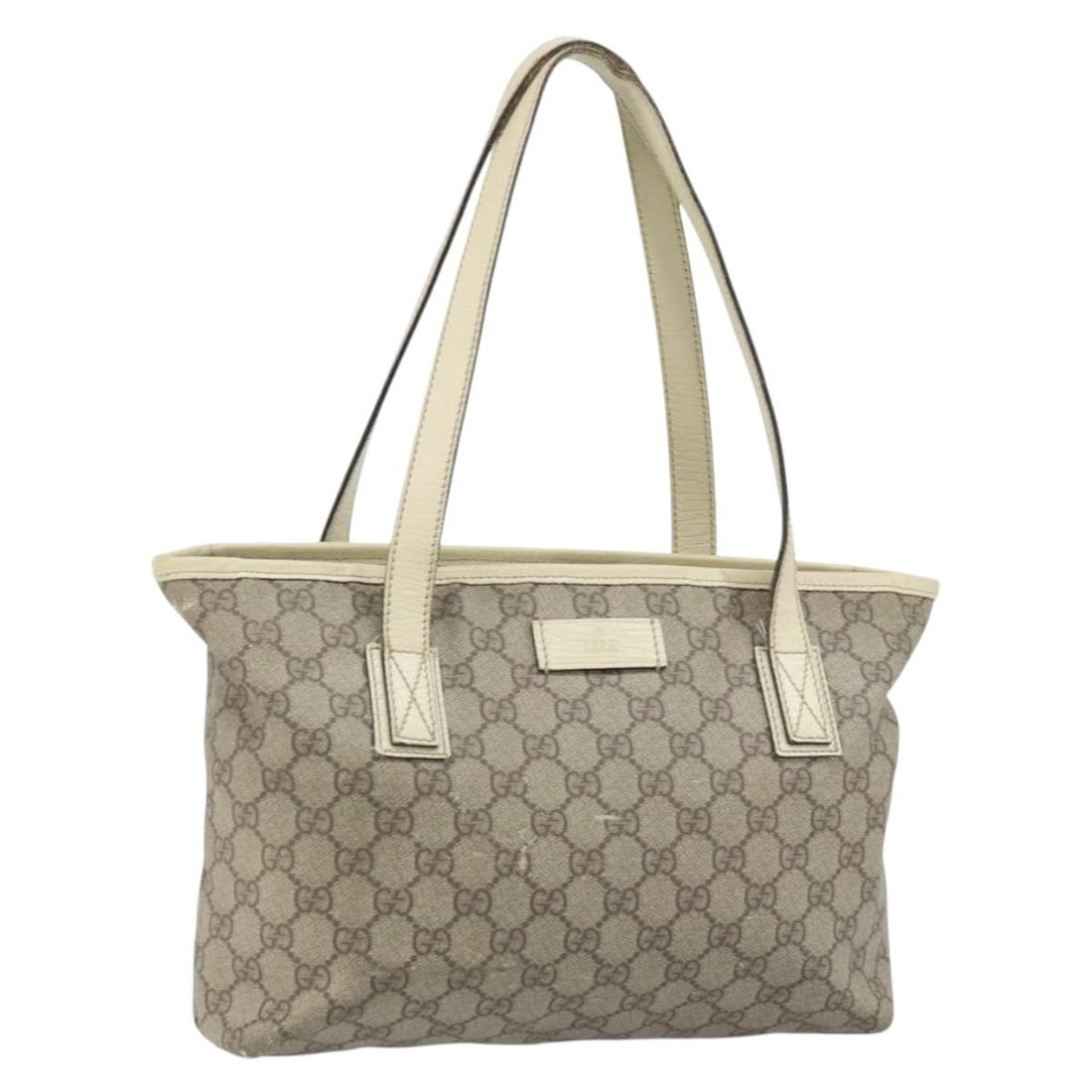 Gucci GG Supreme beige silver tote 181086 PVC leather: Gucci GG Supreme beige silver tote 181086 PVC leather This GUCCI GG Supreme Tote Bag features a beige and silver color scheme crafted from PVC leather and GG canvas. Made in Italy, the bag is designed