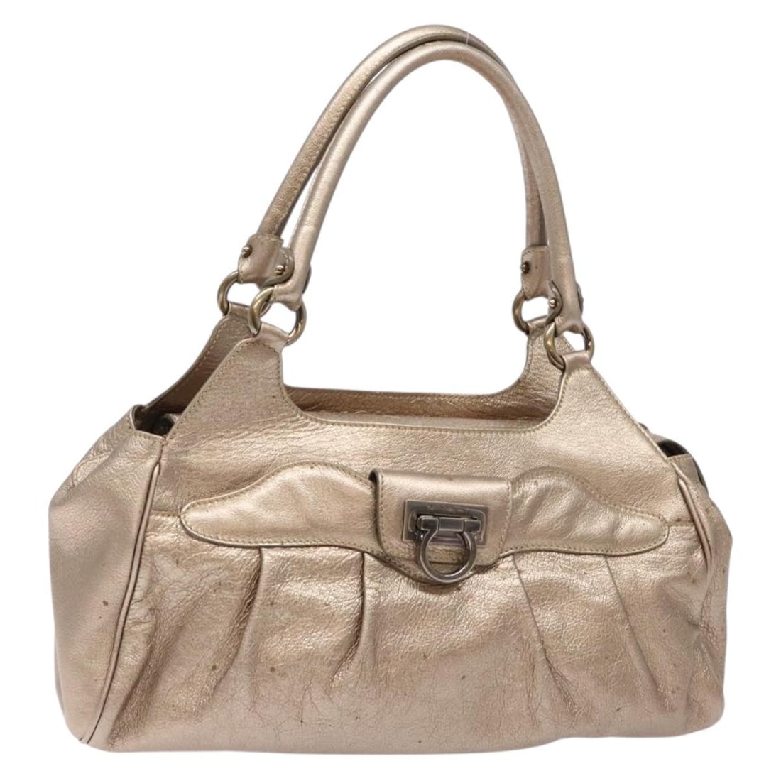 Salvatore Ferragamo Gancini Gold Leather Women's Handbag: Salvatore Ferragamo Gancini Gold Leather Women's Handbag This Salvatore Ferragamo Gancini handbag is crafted from gold leather and features a classic design. The bag is made in Italy and is sized appr