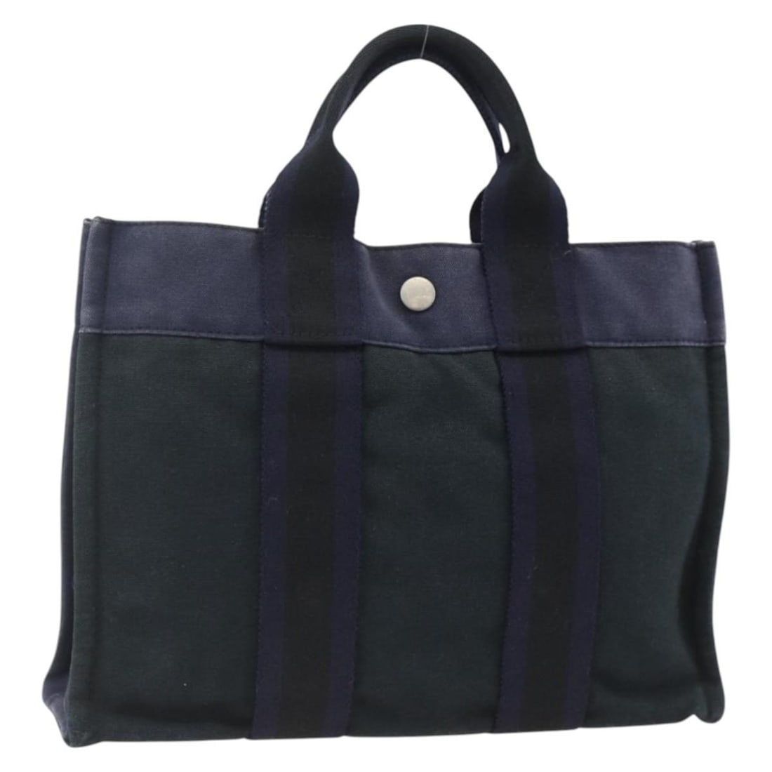 Hermes Fourre Tout PM Navy Canvas Tote with Silver Accents: Hermes Fourre Tout PM Navy Canvas Tote with Silver Accents This Hermes Fourre Tout PM tote bag is crafted from navy and silver canvas. Designed for women, it features dual top handles and a spacious m