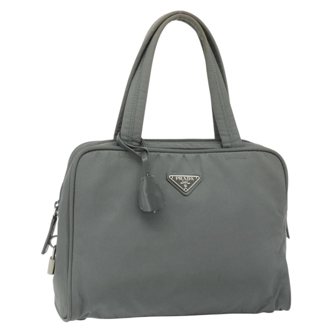 PRADA Nylon Handbag Gray Silver with Padlock Key Clochette: PRADA Nylon Handbag Gray Silver with Padlock Key Clochette Prada women's nylon handbag in gray and silver, made in Italy. This piece includes a padlock, two keys, a clochette, and a guarantee card. Co