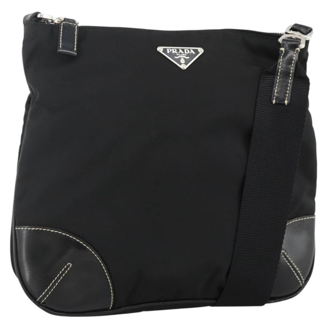 PRADA Nylon Shoulder Bag Black Silver with Guarantee Card: PRADA Nylon Shoulder Bag Black Silver with Guarantee Card A Prada shoulder bag crafted in nylon with a black and silver exterior. Made in Italy, it is designed for women and comes with a guarantee car