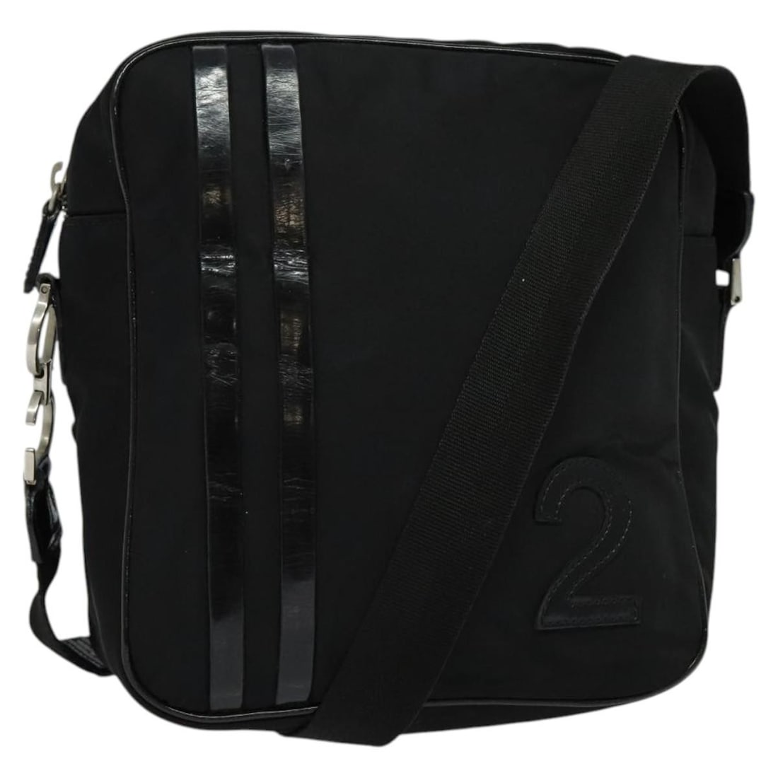 Christian Dior Black Nylon Women's Shoulder Purse Made in Italy: Christian Dior Black Nylon Women's Shoulder Purse Made in Italy This Christian Dior shoulder bag is crafted from black nylon and designed for women. Made in Italy, it features an adjustable shoulder s