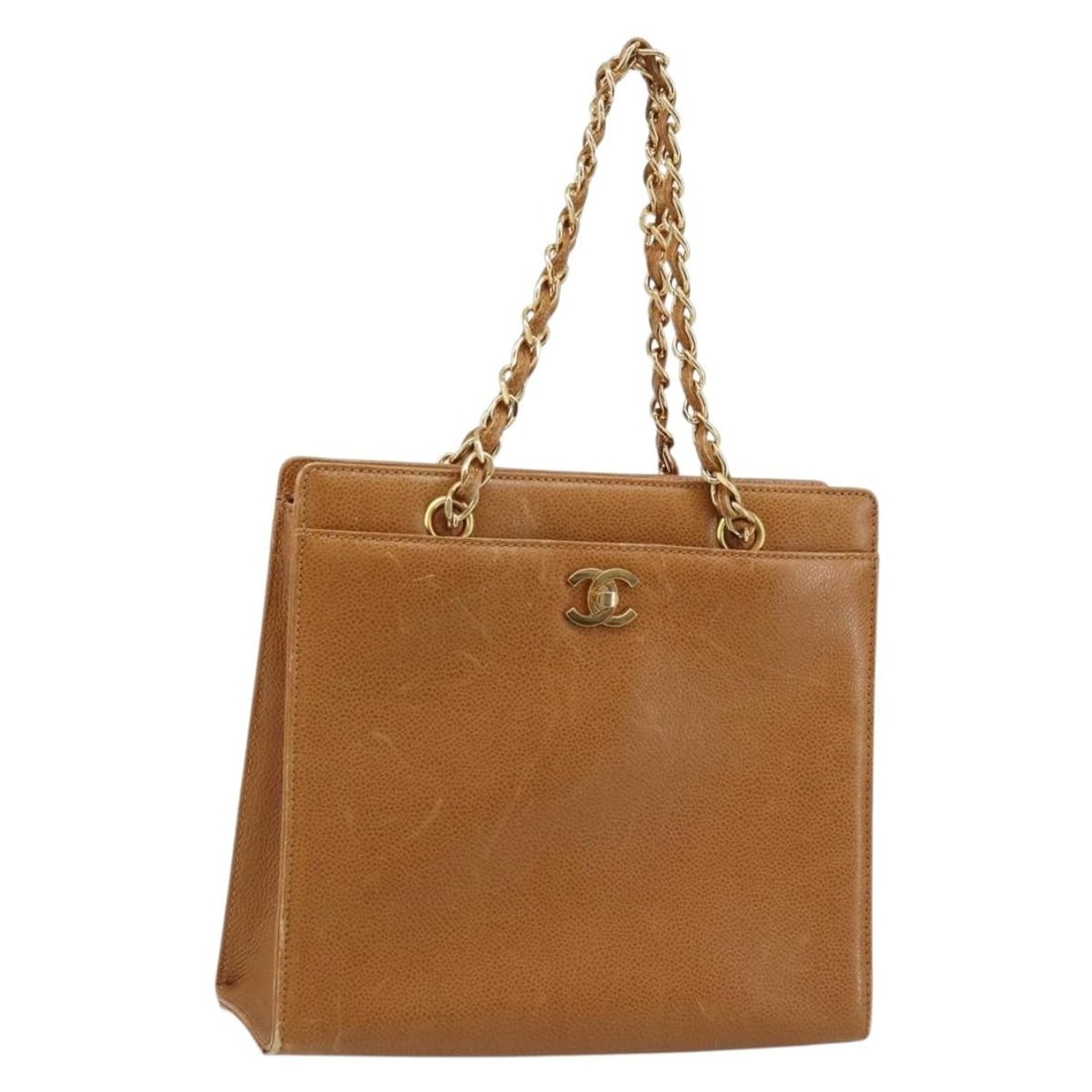 Grained Caviar Leather Chain Tote in Gold Brown by Chanel: Grained Caviar Leather Chain Tote in Gold Brown by Chanel This CHANEL Chain Tote Bag is crafted from grained Caviar calfskin in a gold and brown colorway, featuring the iconic CC logo. Designed for wo