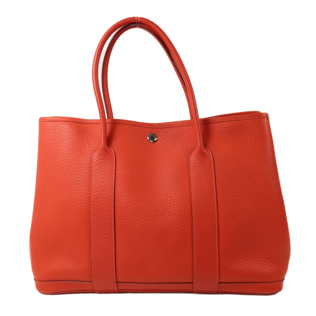 Hermes Garden Party PM Red Taurillon Clemence Leather Handbag PHW: Hermes Garden Party PM Red Taurillon Clemence Leather Handbag PHW Hermes Garden Party PM handbag in Rouge Tomate red, crafted from Taurillon Clemence leather / calfskin (cowhide). This women's handbag