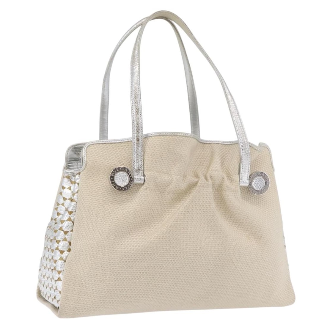 BVLGARI Beige Canvas Hand Bag Silver Tone Made in Italy: BVLGARI Beige Canvas Hand Bag Silver Tone Made in Italy A BVLGARI handbag in beige and silver canvas, made in Italy. The bag measures approximately 36 cm wide by 24 cm high by 15 cm deep, with a handl