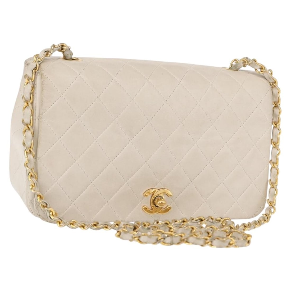 Chanel White Lambskin Matelasse Shoulder Bag with Gold Tone Turn Lock Chain: Chanel White Lambskin Matelasse Shoulder Bag with Gold Tone Turn Lock Chain This authentic CHANEL Matelasse Turn Lock Chain Bag features luxurious lambskin leather in a classic white color with gold-t